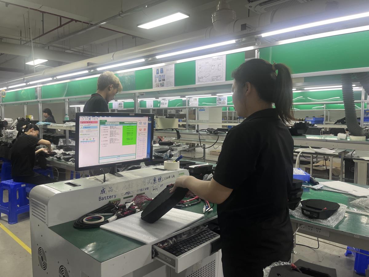 Car jump starter in production.JPG